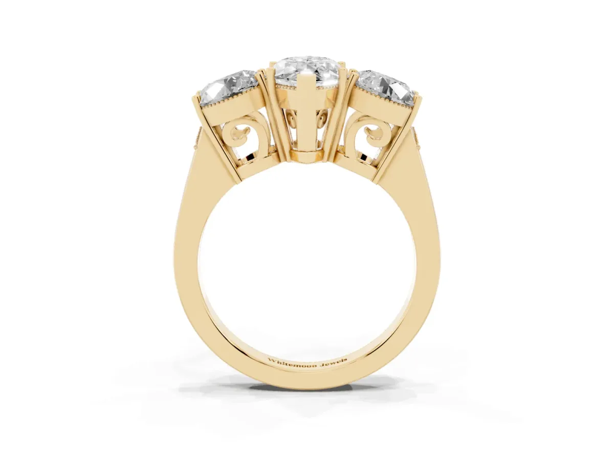 Three-Stone Marquise Cut Diamond Engagement Ring with Prong Setting on a Classic Band Yellow gold