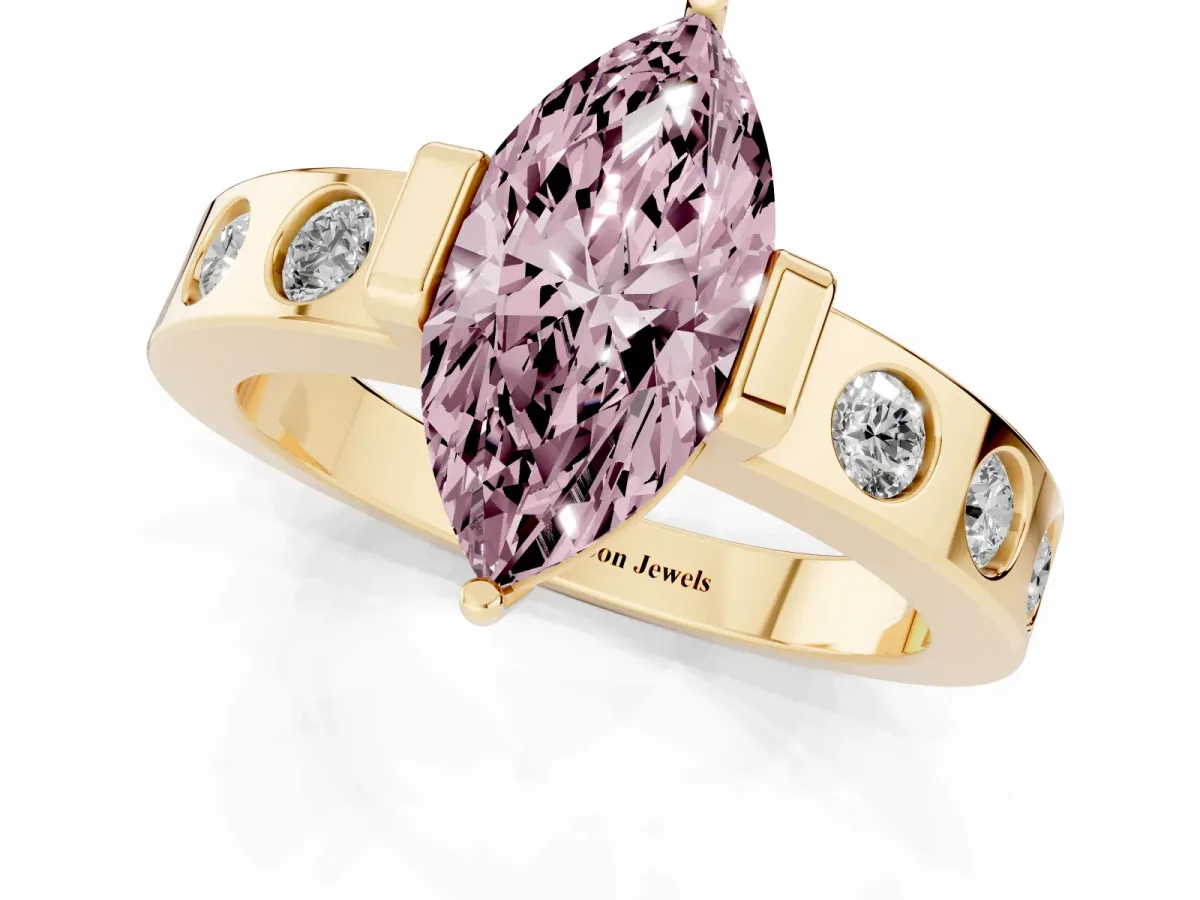 Fancy Pink Marquise Cut Brilliant Channel-Set Diamond Ring with Bezel Prong Setting Yellow gold