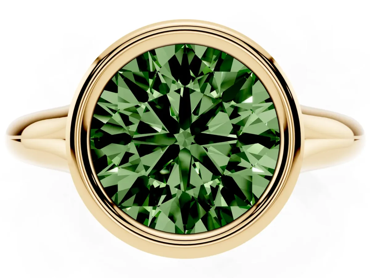 Fancy Green Bezel Set Round Cut Solitaire Diamond Ring with Smooth Band Yellow gold