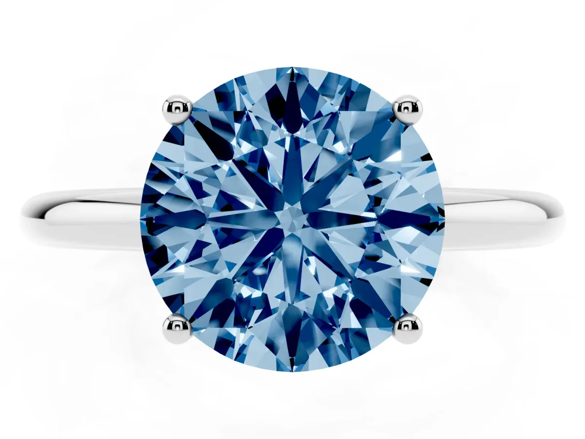 Fancy Blue Round Cut Cut Solitaire Engagement Ring with Four-Prong Setting and Classic Band Silver