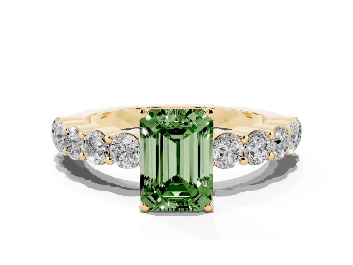 Fancy Green Emerald Cut Diamond Solitaire Ring with Shared Prong Round Side Stones Yellow gold