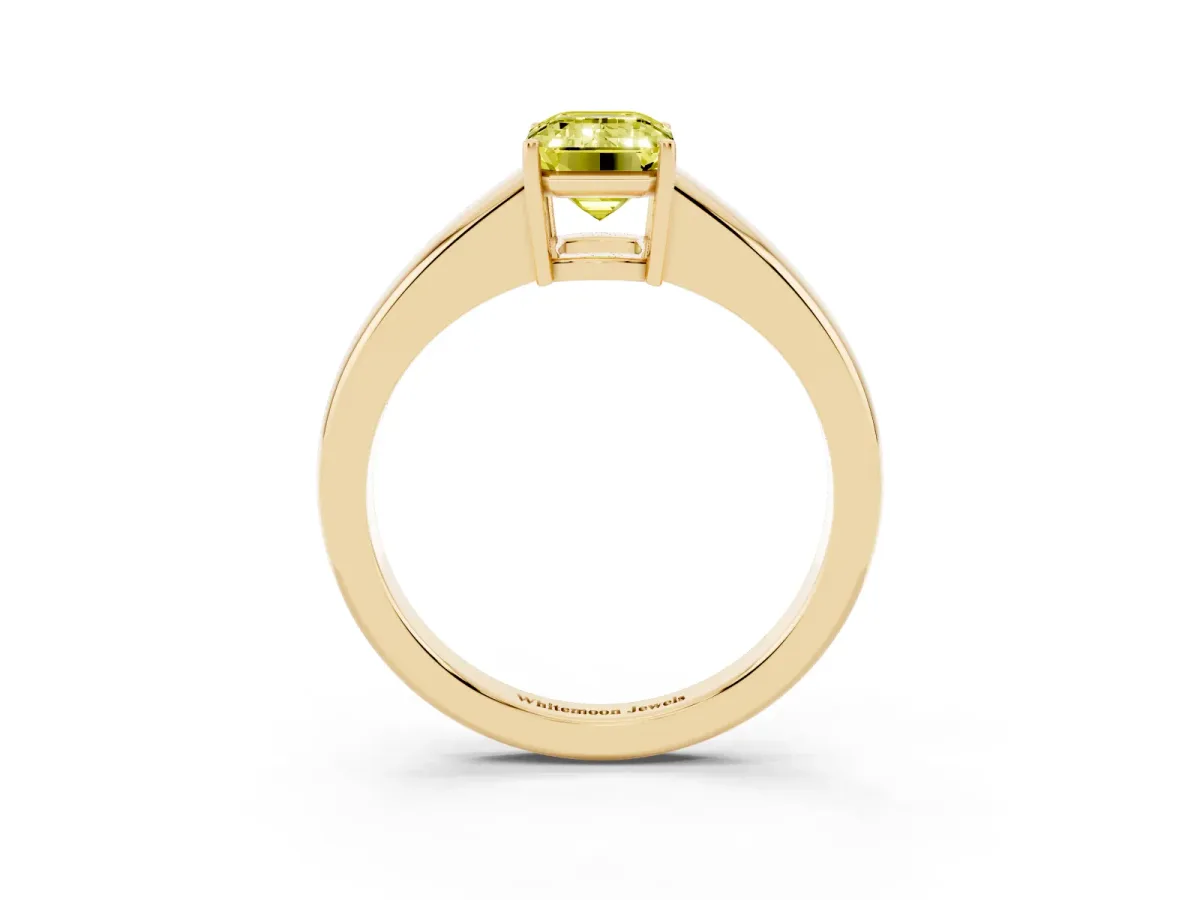 Fancy Yellow Emerald Cut Solitaire Diamond Ring with Tapered Band and Four-Prong Setting Yellow gold