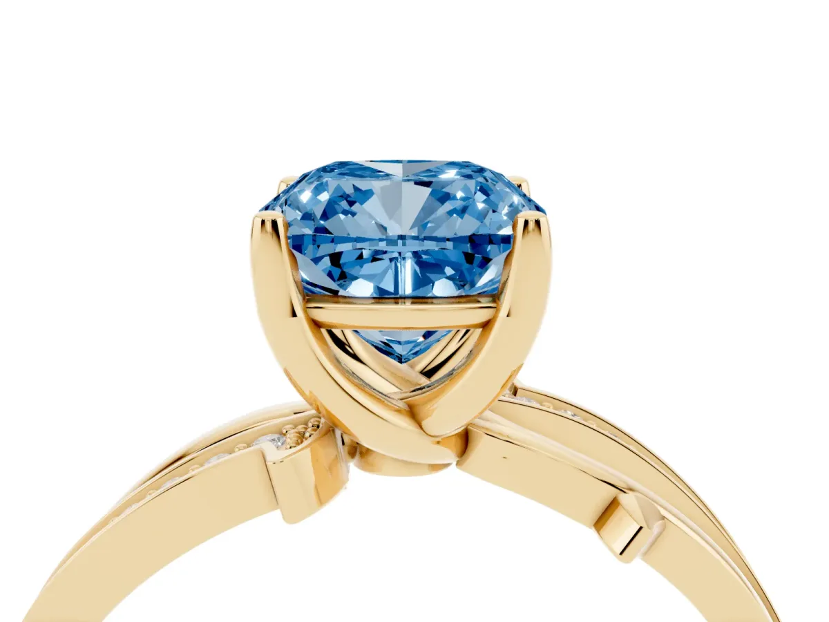 Fancy Blue Cushion Cut Solitaire Twist Band with Pavé Accents and Four-Prong Setting Yellow gold