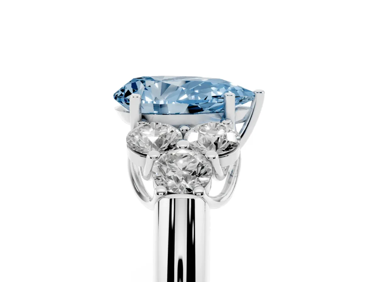 Fancy Blue Pear Cut Cut Diamond Cluster Ring with Round Accent Stones and Prong Setting on a Classic Band White gold