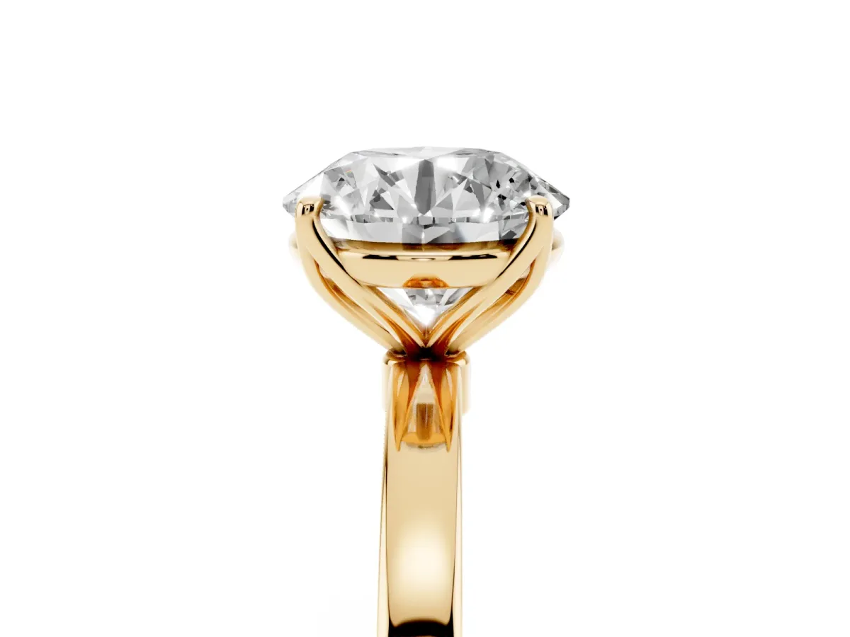 Round Cut Diamond Solitaire Ring with Thin Band and Prong Setting Yellow gold