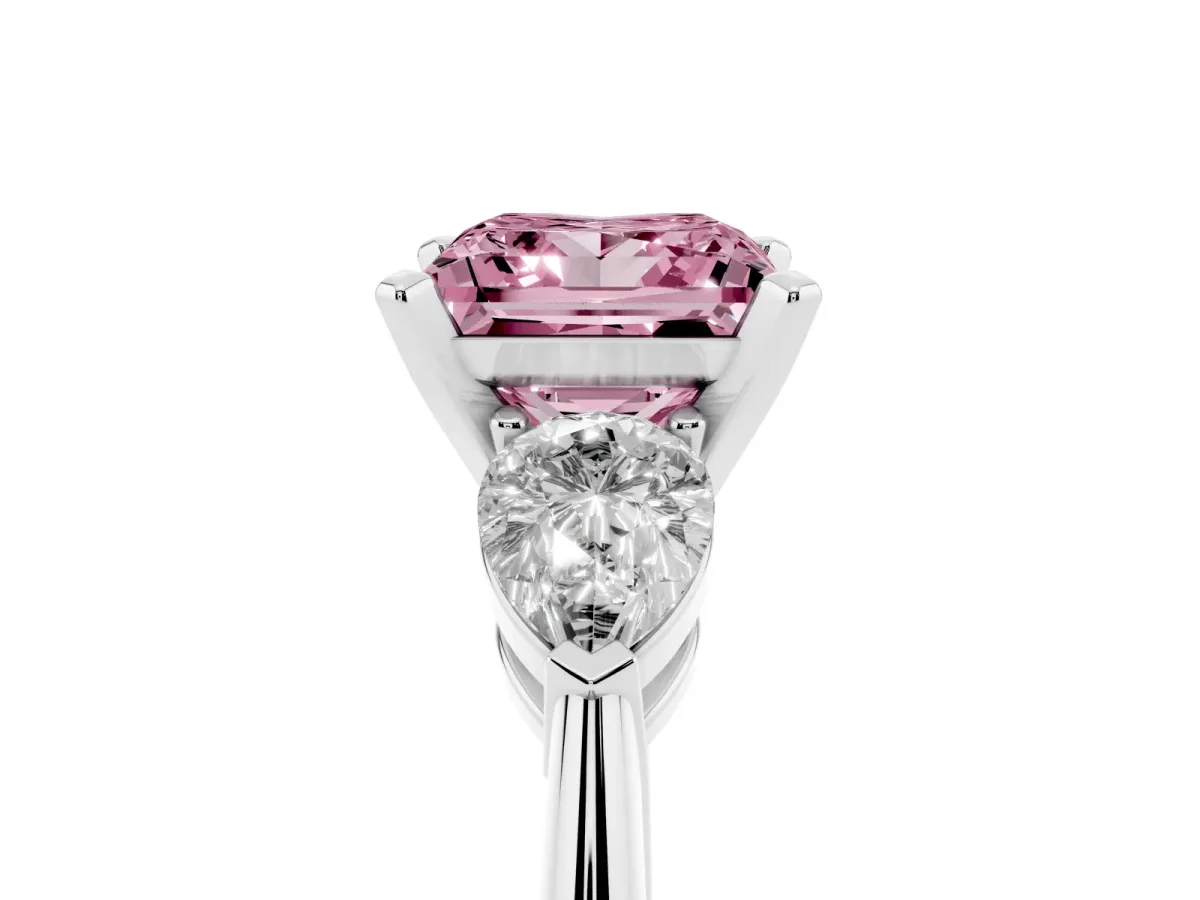 Fancy Pink Three-Stone Princess Cut Diamond Ring with Pear Side Stones and Four-Prong Setting Silver