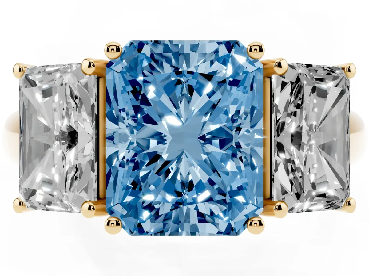 Fancy Blue Three-Stone Radiant Cut Diamond Engagement Ring with Prong Setting Yellow gold