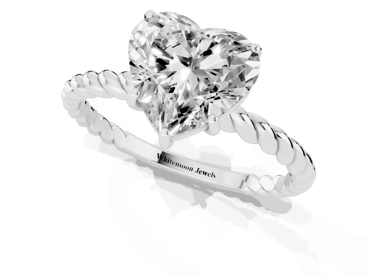 Heart Cut Solitaire Twisted Band 4-Prong Ring Silver