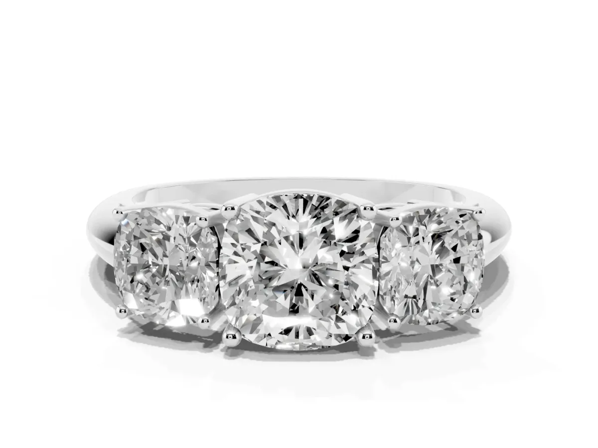 Three-Stone Cushion Cut Cut Diamond Engagement Ring with Prong Setting on a White Gold Band White gold
