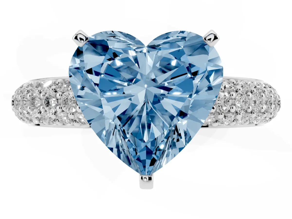 Fancy Blue Heart Cut Diamond Solitaire Ring with Prong Setting and Pavé Band Silver