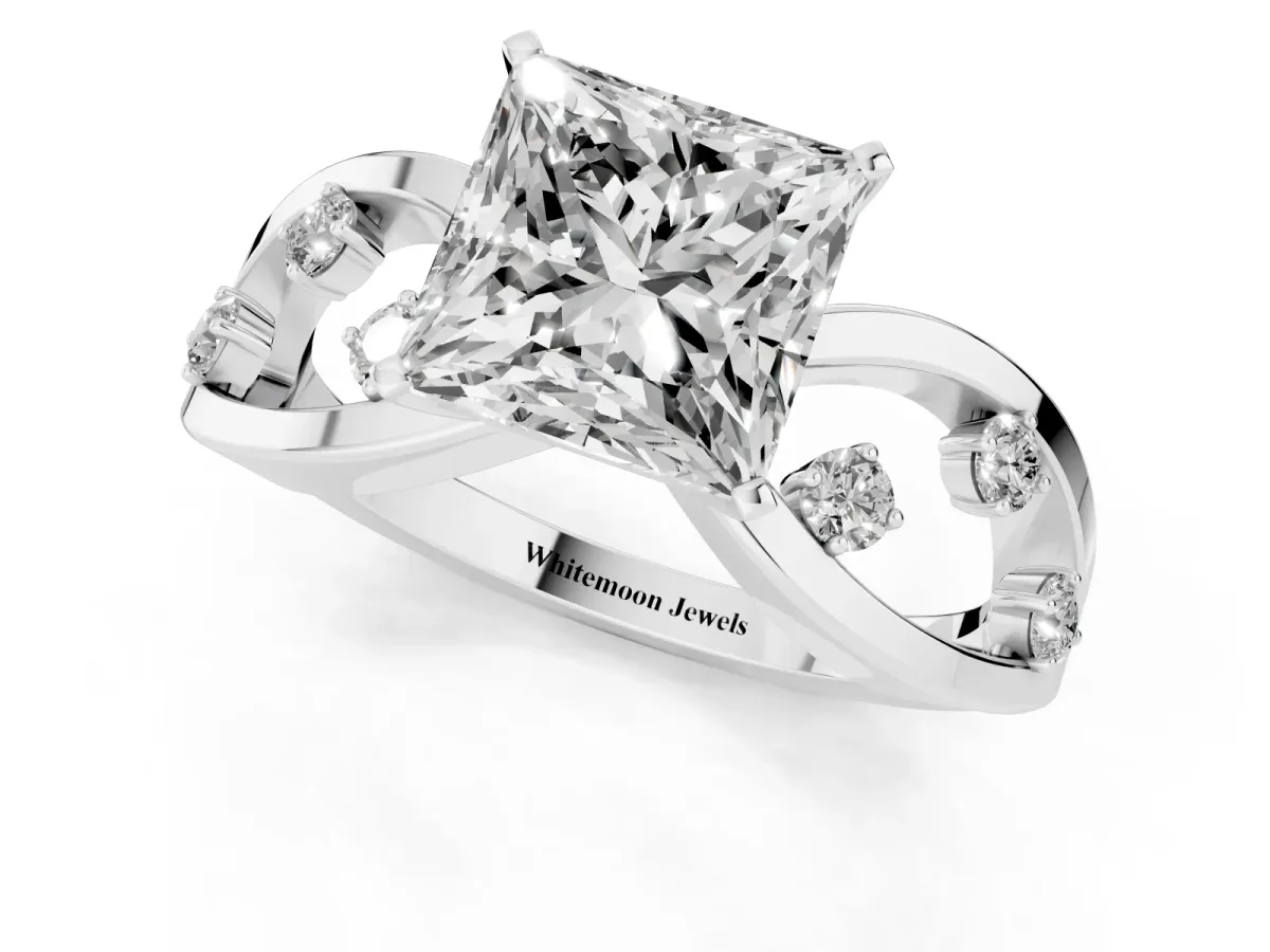Princess Cut Cut Solitaire Diamond with Side Stones on Criss-Cross Band and Four-Prong Setting Silver