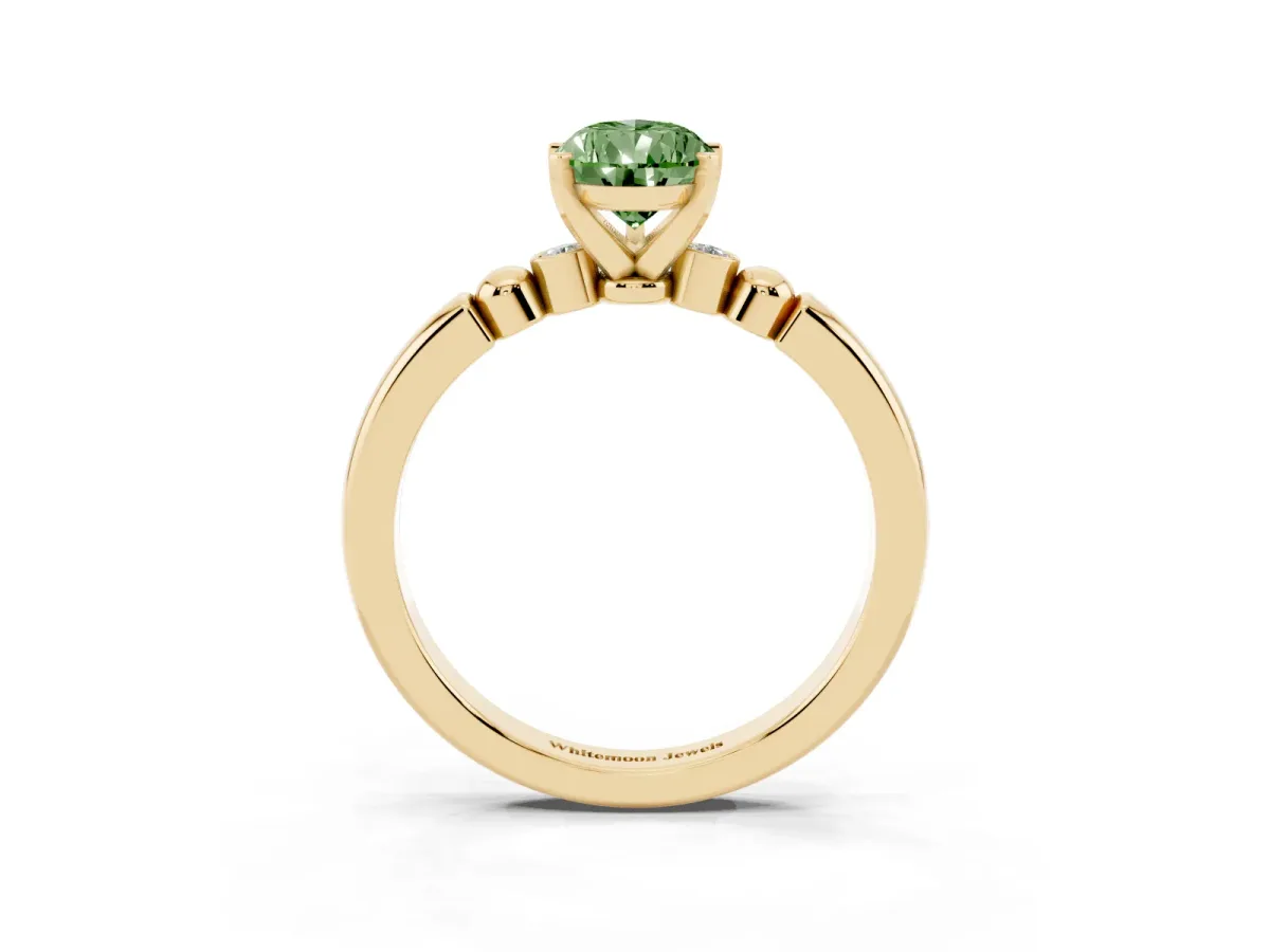 Fancy Green Pear Cut Solitaire Beaded Band with Four-Prong Setting Yellow gold