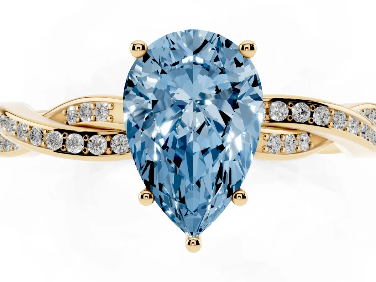 Fancy Blue Pear Cut Solitaire Twisted Pave Diamond Ring with Four-Prong Setting Yellow gold