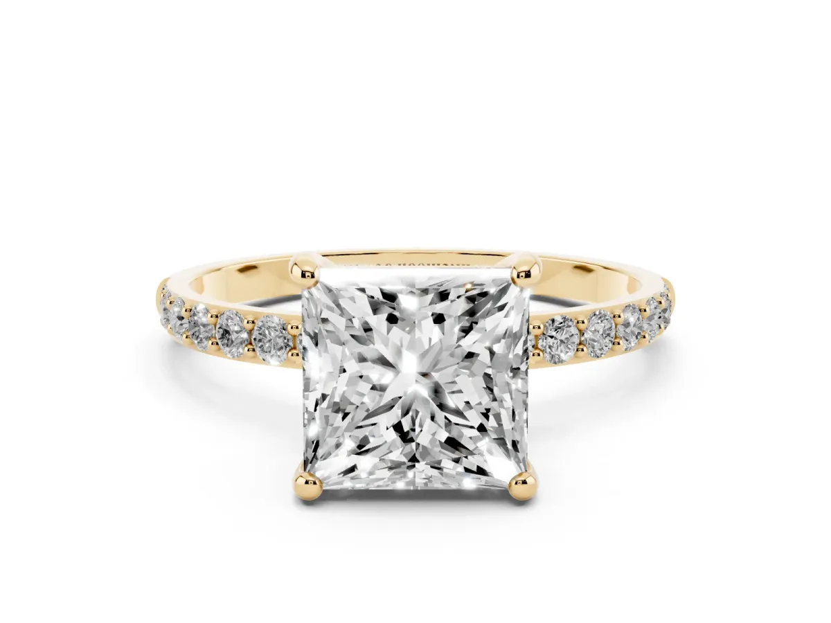Princess Cut Diamond Solitaire Ring with Round Pavé Band and Prong Setting Yellow gold