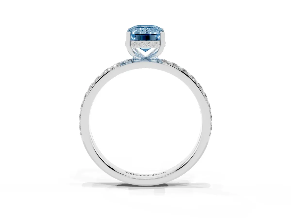 Fancy Blue Emerald Cut Diamond Solitaire Ring with Pavé Band and Hidden Halo White gold