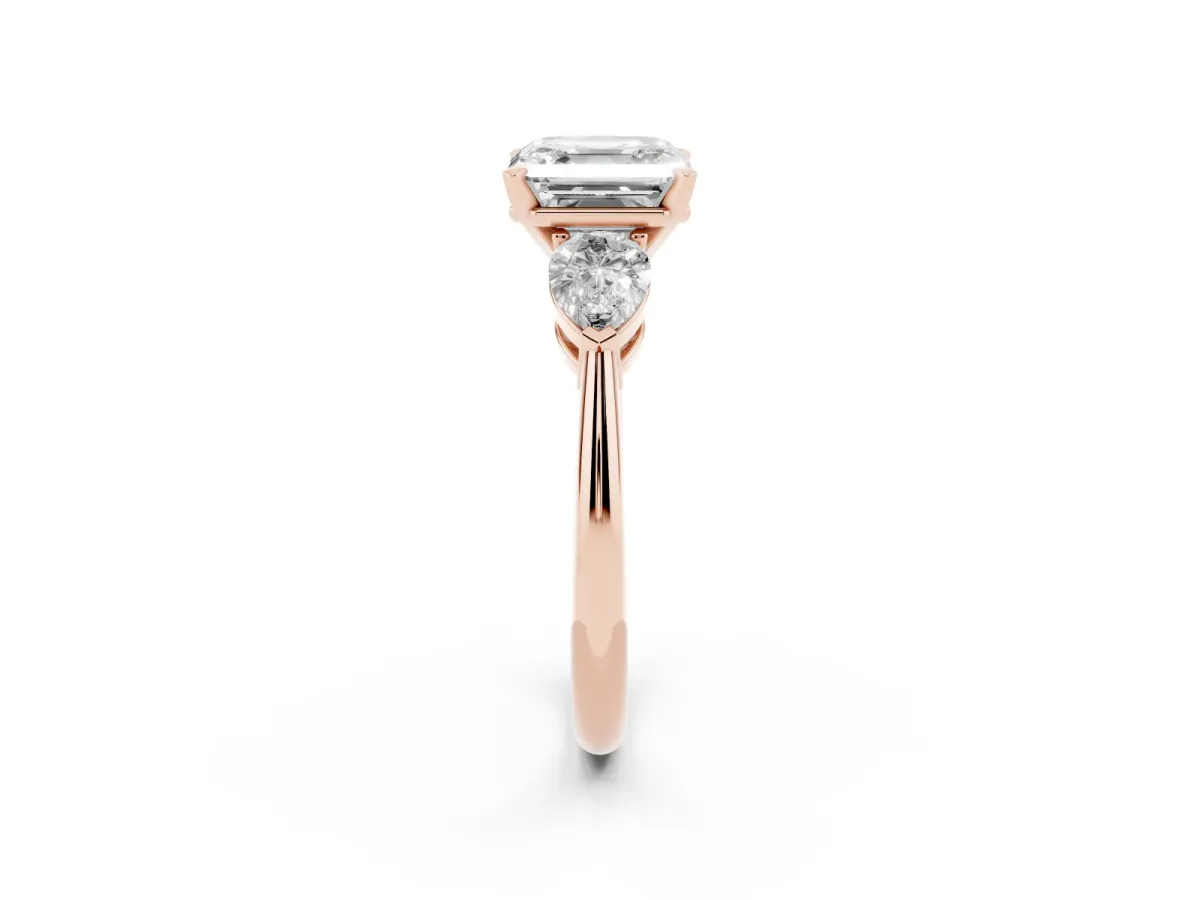 Three-Stone Asscher Cut Diamond Ring with Pear Side Stones and Four-Prong Setting Rose gold
