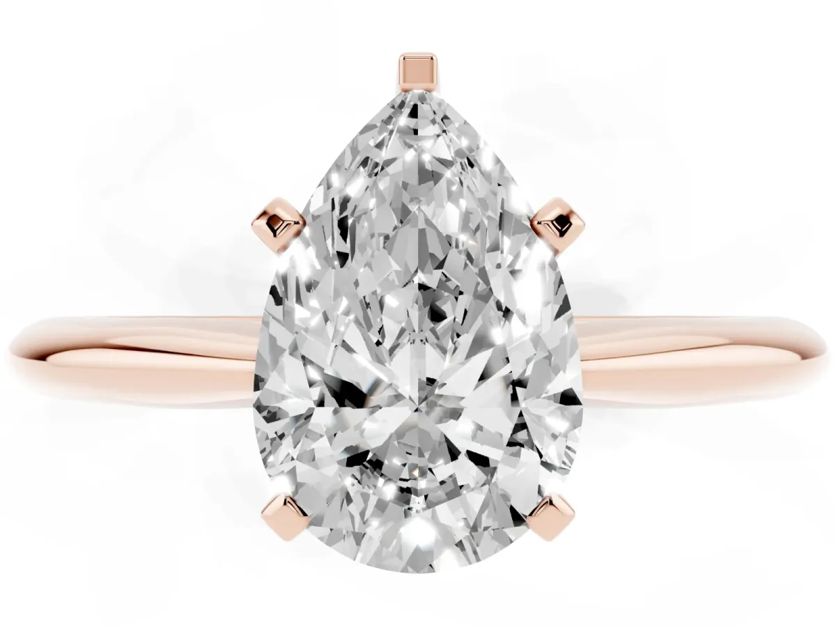 Pear Cut Cut Solitaire Ring with Four-Prong Setting on a Classic Band Rose gold