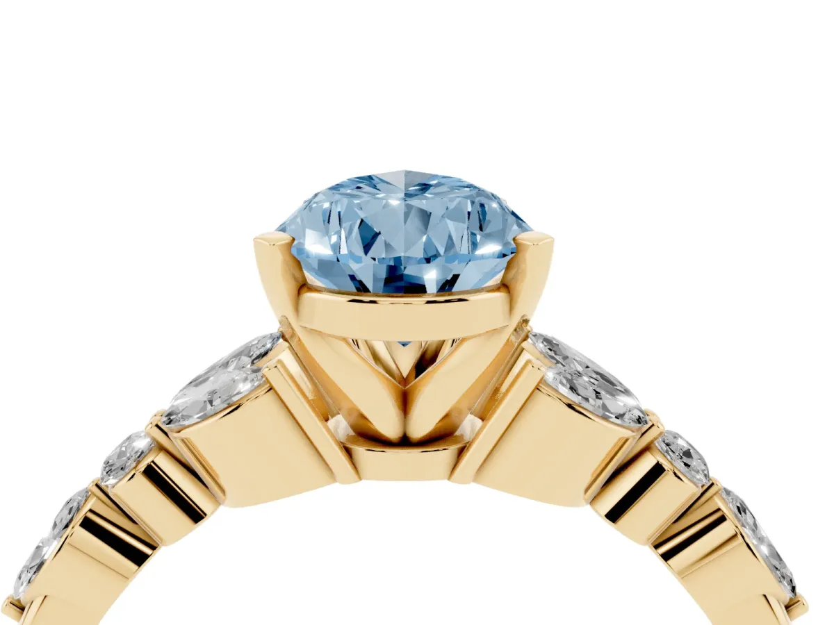 Fancy Blue Pear Cut Diamond Solitaire Ring with Side Stones and Four-Prong Setting Yellow gold