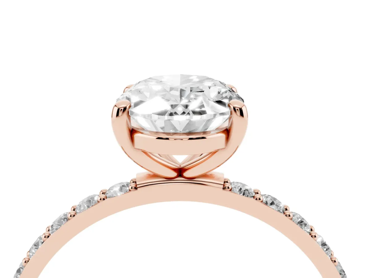 Oval Cut Diamond Solitaire Ring with Round Pavé Band and Prong Setting Rose gold