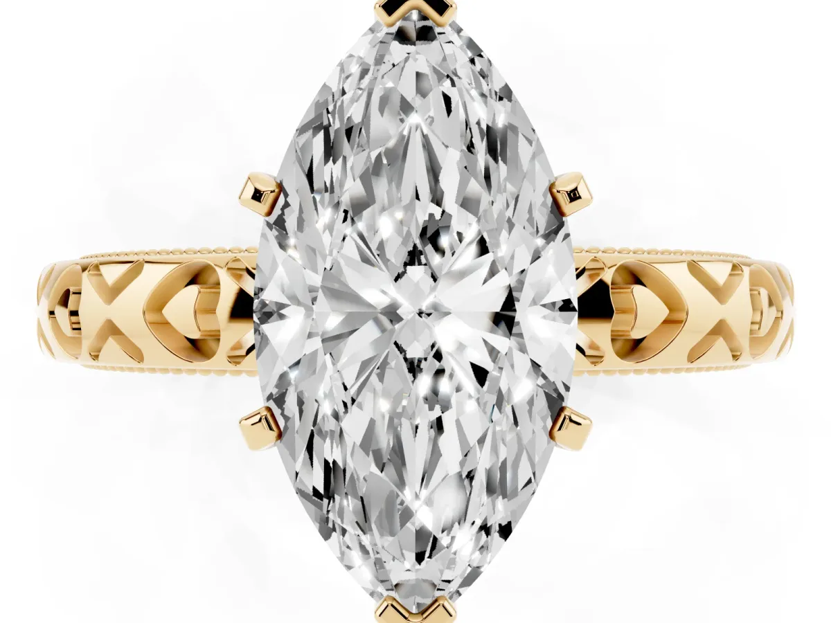 Marquise Cut Solitaire Diamond Engagement Ring with XO Engraved Band and Four-Prong Setting Yellow gold