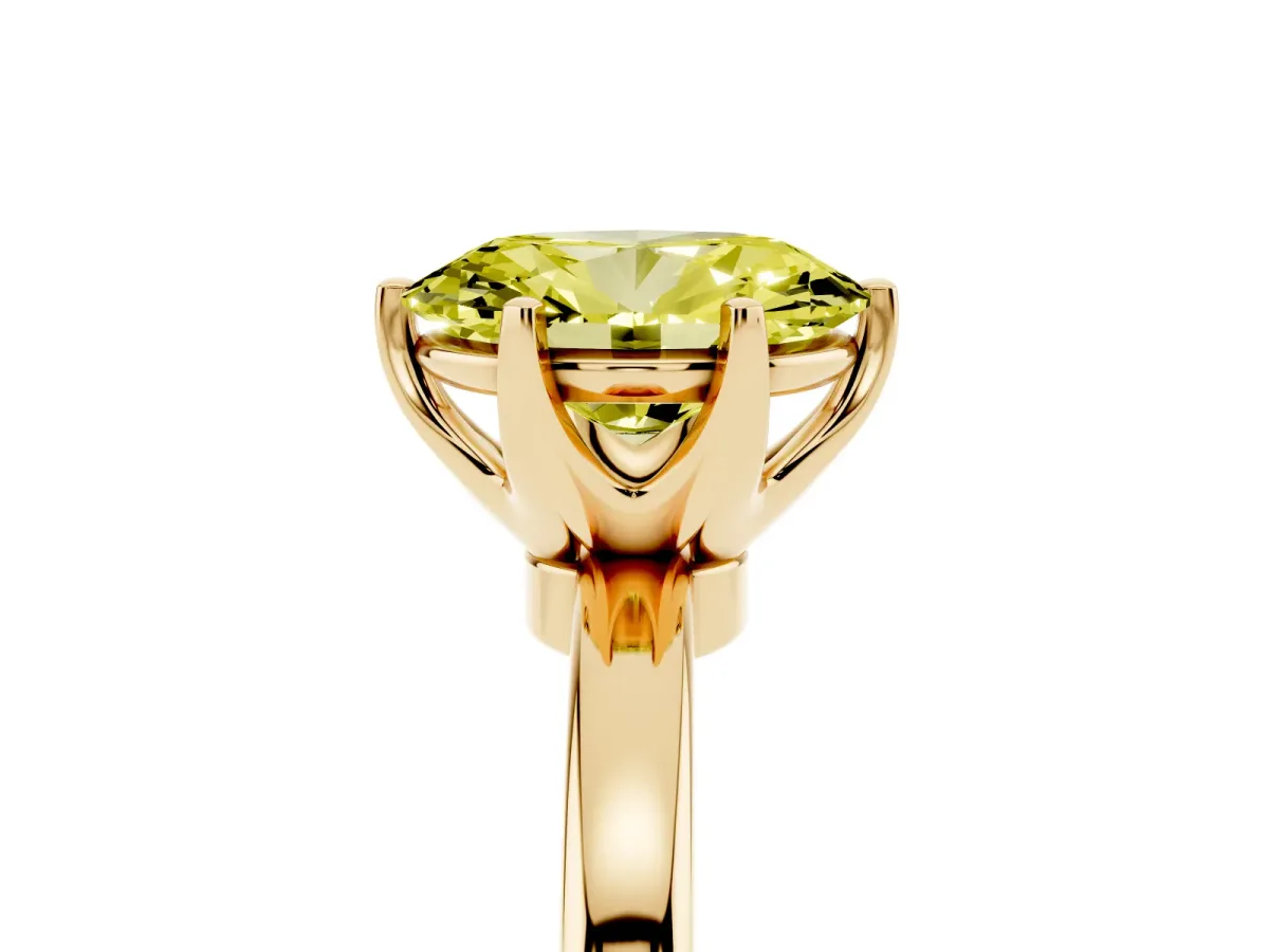 Fancy Yellow Oval Cut Solitaire Diamond Ring with Six-Prong Setting on a Classic Band Yellow gold