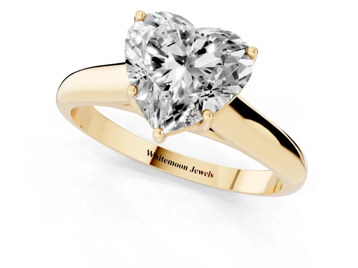 Heart Cut Cut Diamond Solitaire Engagement Ring with Tapered Plain Band and Four-Prong Setting Yellow gold