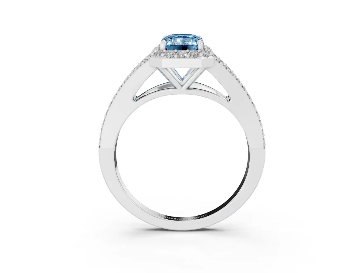 Fancy Blue Emerald Cut Halo Split Shank Pave Diamond Ring with Four-Prong Setting Silver