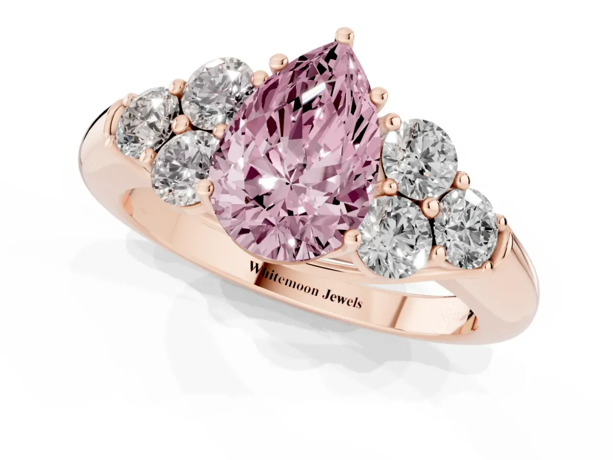 Fancy Pink Pear Cut Cut Diamond Cluster Ring with Round Accent Stones and Prong Setting on a Classic Band Rose gold