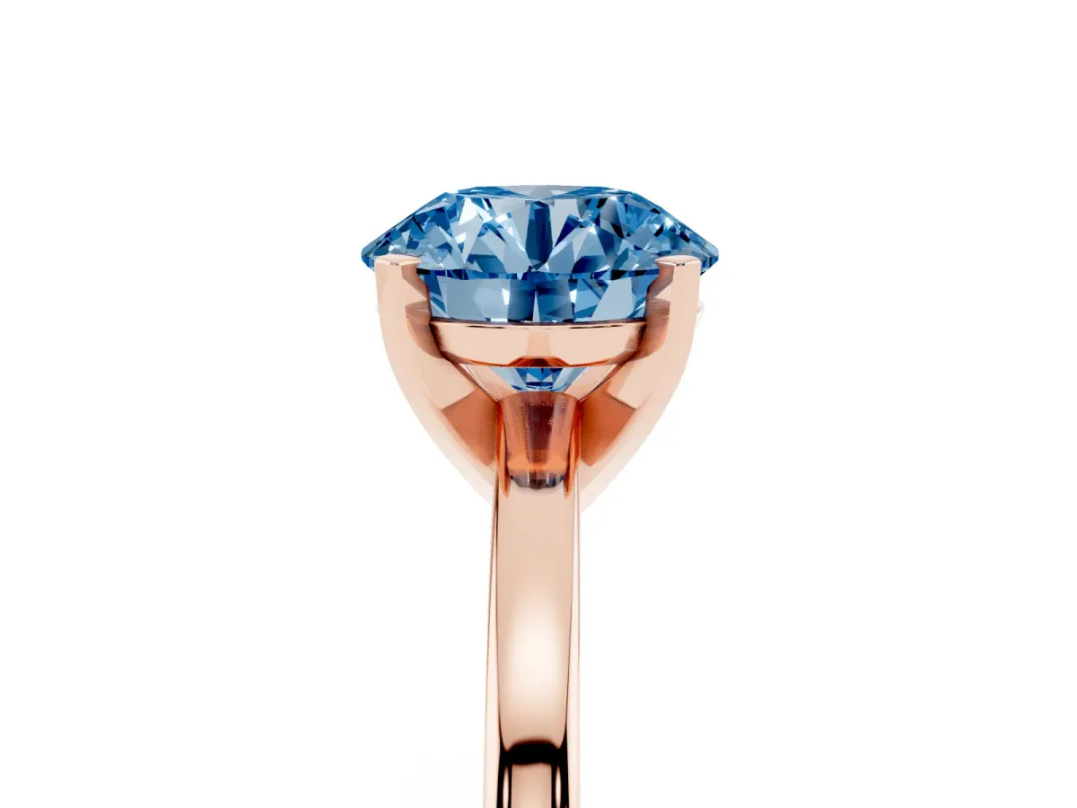 Fancy Blue Round Cut Solitaire Diamond Engagement Ring with Four-Prong Setting on a Classic Band Rose gold