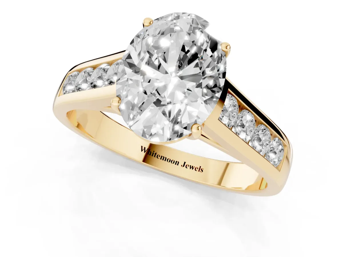 Oval Cut Brilliant Channel-Set Solitaire Ring with Four-Prong Setting Yellow gold