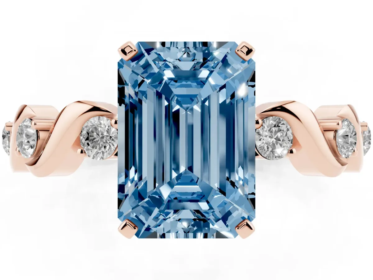 Fancy Blue Emerald Cut Diamond Solitaire Twisted Band with Round Accents and Prong Setting Rose gold