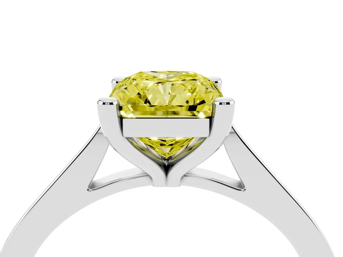 Fancy Yellow Radiant Cut Solitaire Diamond Ring with Four-Prong Setting and Tapered Band Silver
