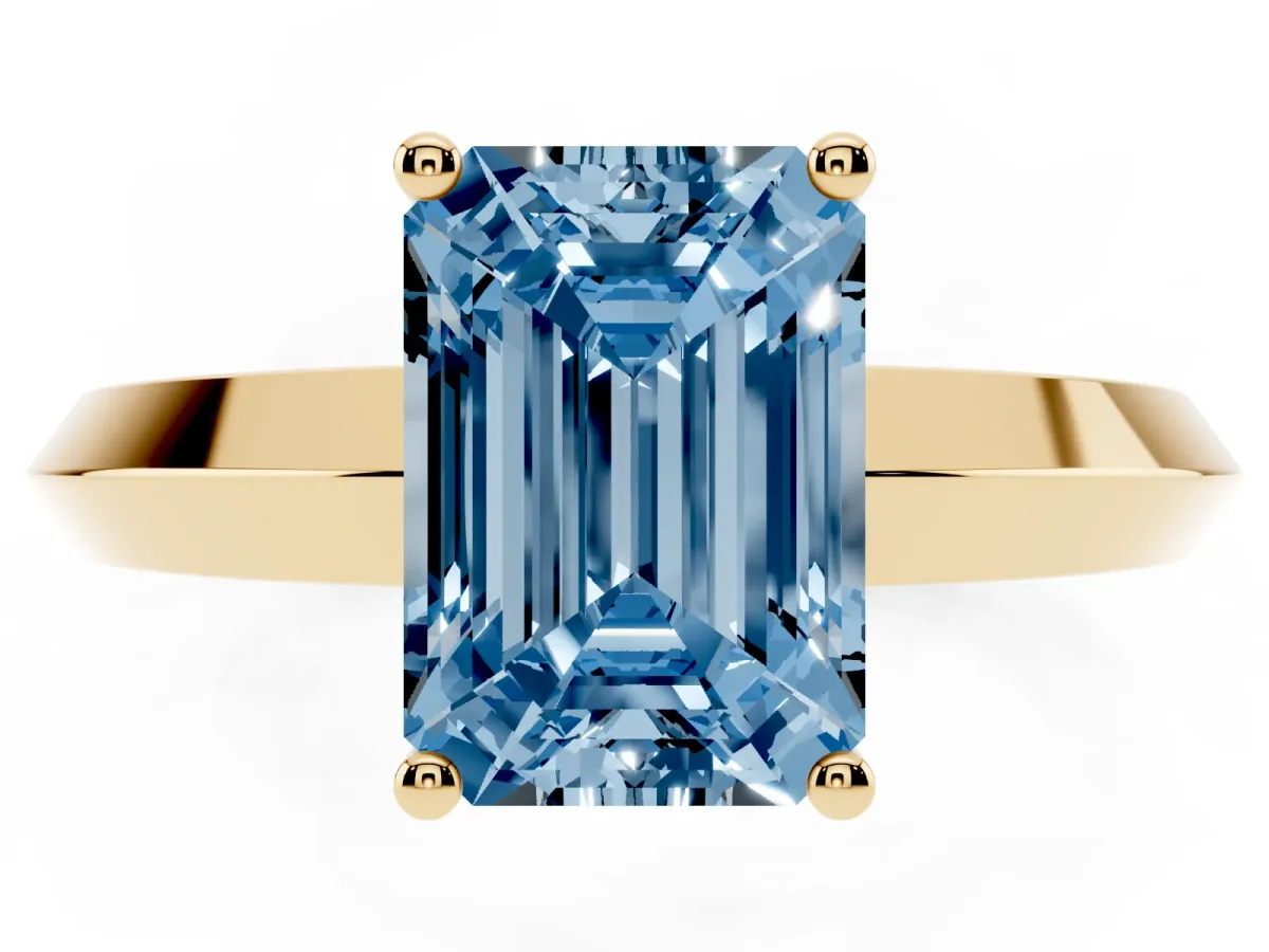Fancy Blue Emerald Cut Cut Solitaire Engagement Ring with Flat Band and Four-Prong Setting Yellow gold