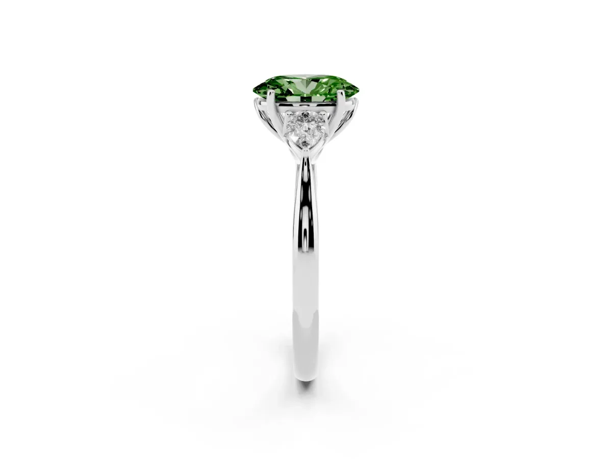 Fancy Green Three-Stone Oval Cut Brilliant Diamond Solitaire Ring with Tapered Band and Four-Prong Setting White gold