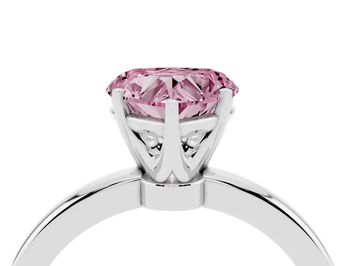 Fancy Pink Heart Cut Solitaire Diamond Ring with Six-Prong Setting on a Classic Band Silver