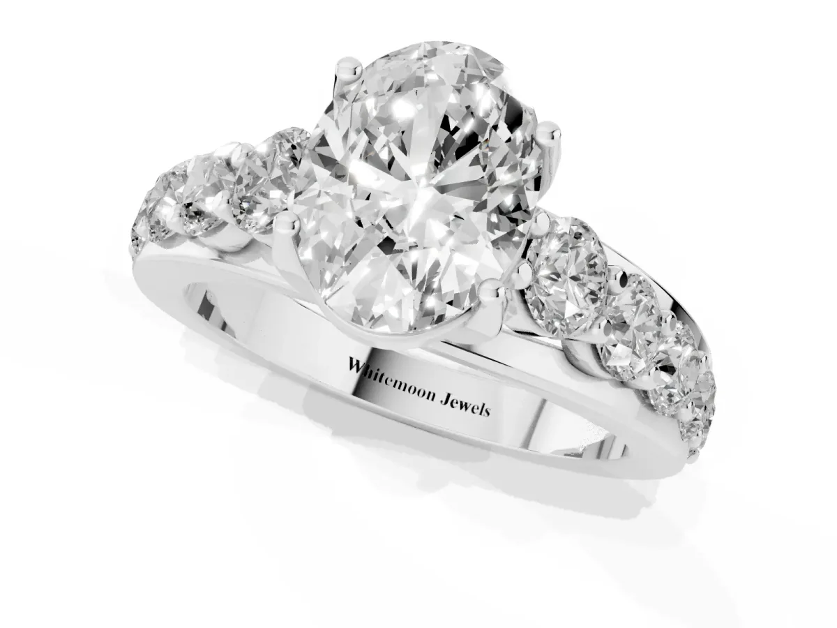 Oval Cut Diamond Engagement Ring with Pavé Band and Four-Prong Setting Platinum