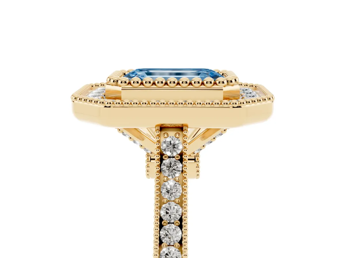 Fancy Blue Emerald Cut Diamond Halo Ring with Milgrain Frame and Pavé Band Yellow gold