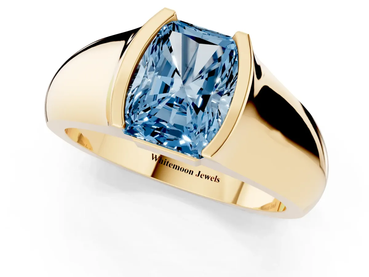 Fancy Blue Radiant Cut Solitaire Bezel Set Diamond Ring with Wide Band Yellow gold