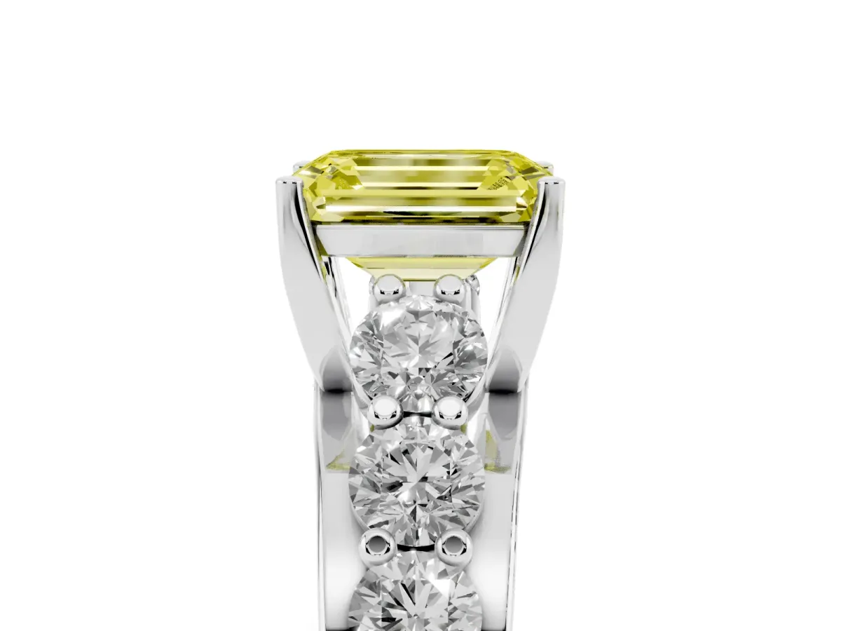 Fancy Yellow Emerald Cut Diamond Engagement Ring with Pavé Band and Four-Prong Setting Silver