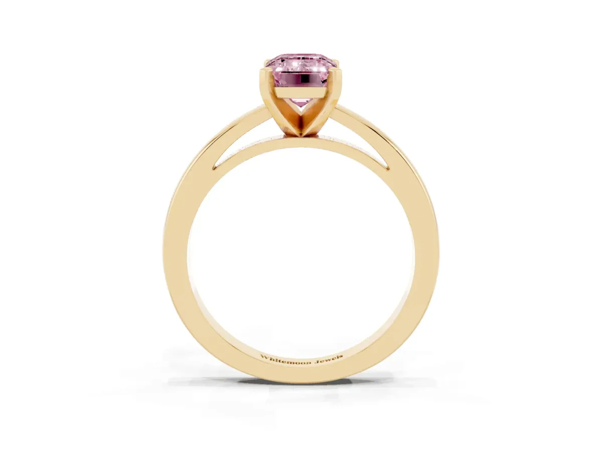 Fancy Pink Emerald Cut Solitaire Diamond Engagement Ring with Four-Prong Setting on a Classic Band Yellow gold