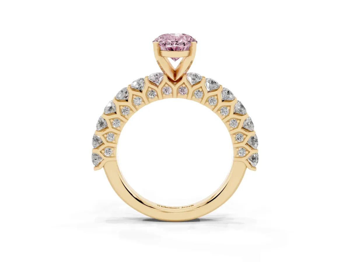 Fancy Pink Oval Cut Diamond Solitaire Ring with Shared Prong Pavé Band and Four-Prong Setting Yellow gold