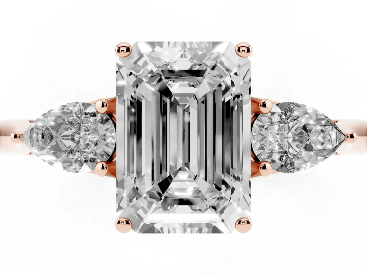 Emerald Cut Diamond Three-Stone Ring with Pear Side Stones and Prong Setting Rose gold