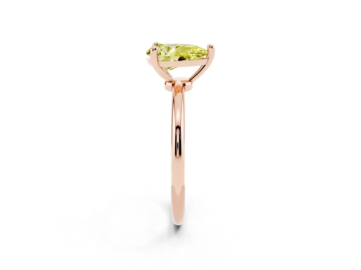 Fancy Yellow Pear Cut Solitaire Diamond Ring with 4-Prong Setting on a Classic Band Rose gold