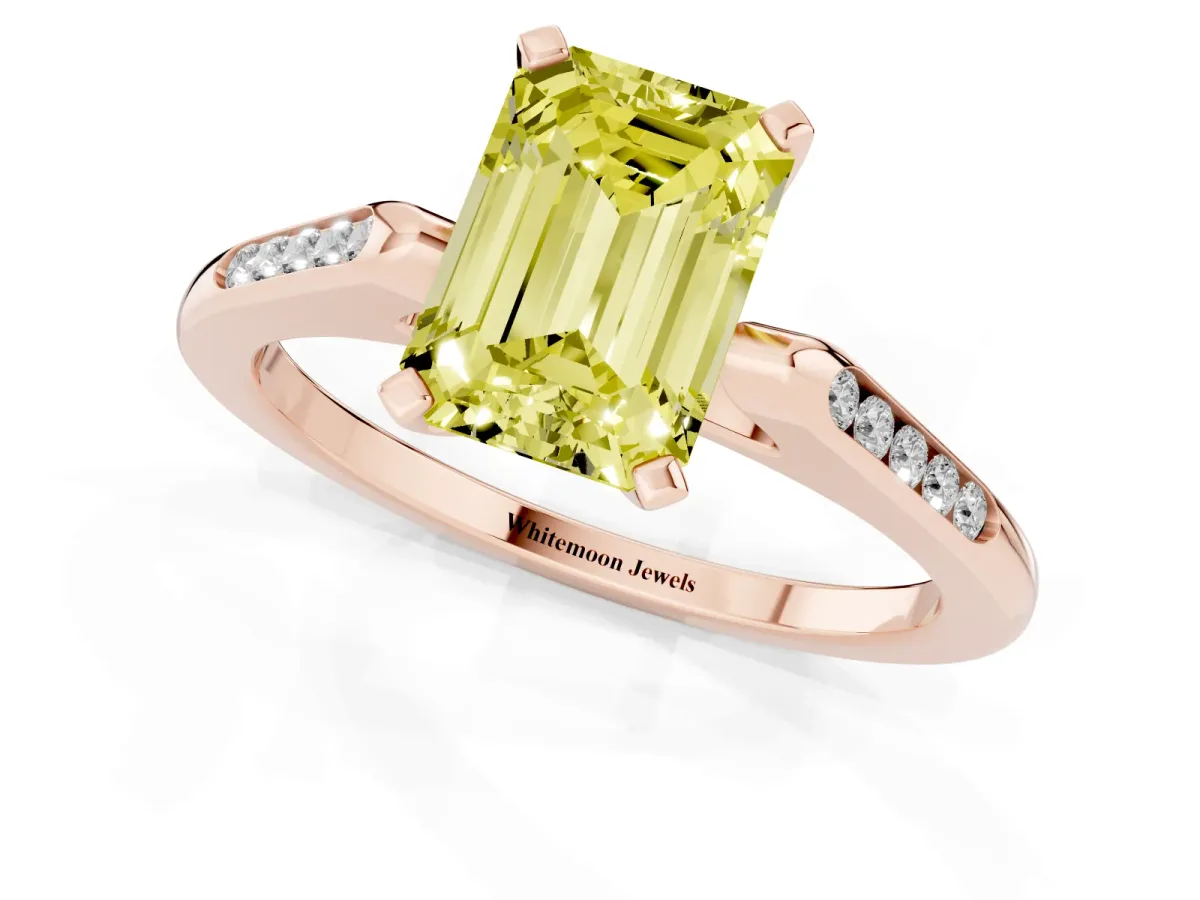 Fancy Yellow Emerald Cut Diamond Solitaire Ring with Channel Set Round Band and Prong Setting Rose gold