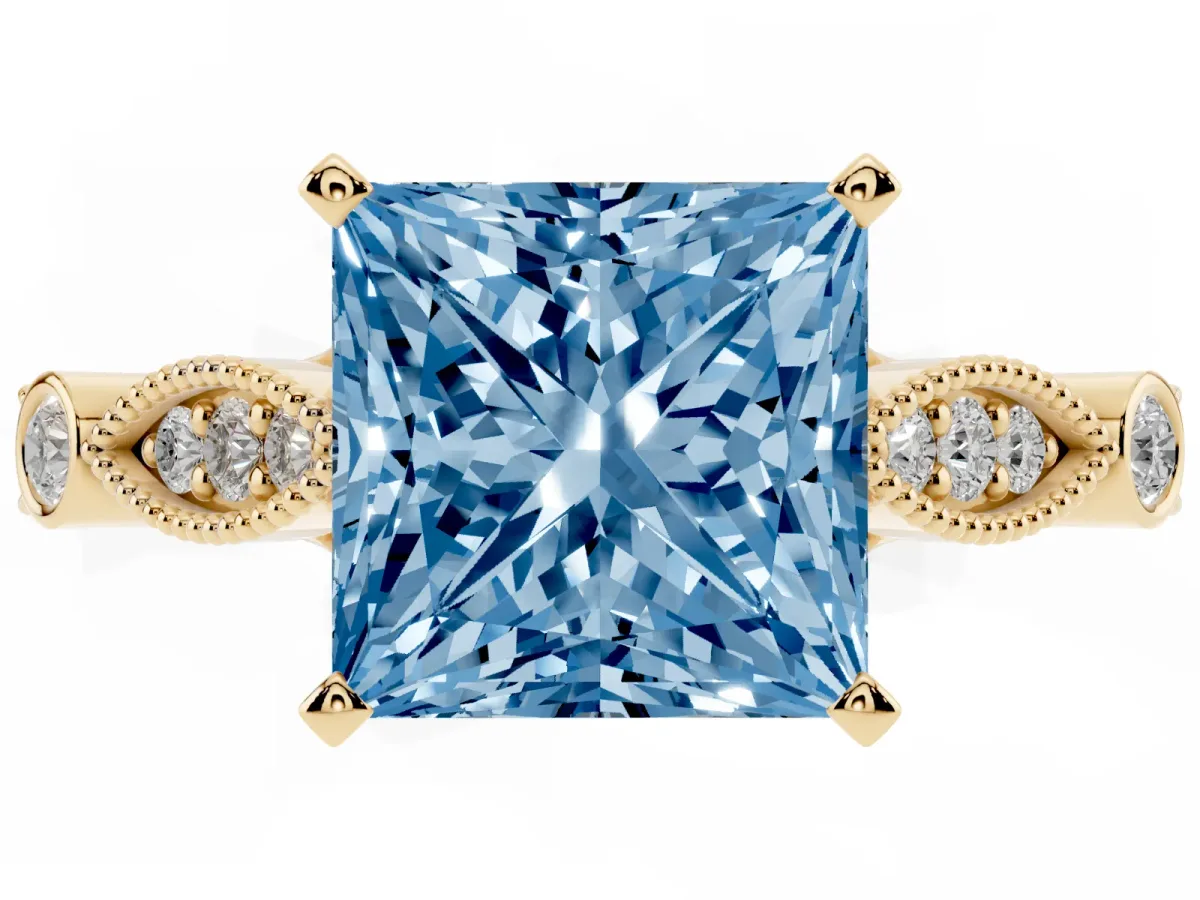 Fancy Blue Princess Cut Cut Diamond with Milgrain Marquise and Bezel Accents on a Solitaire Band with Prong Setting Yellow gold