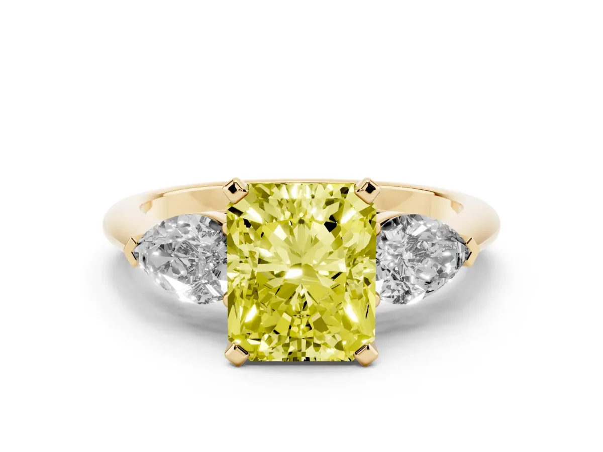 Fancy Yellow Three-Stone Radiant Cut Diamond Ring with Pear Side Stones and Four-Prong Setting Yellow gold