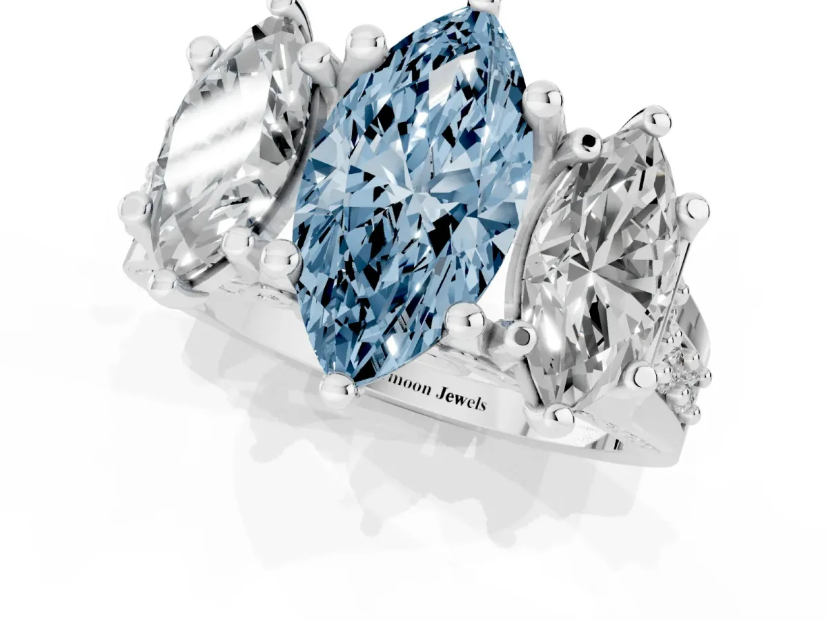 Fancy Blue Marquise Cut Diamond Three-Stone Ring with Channel Set Band and Four-Prong Setting Silver