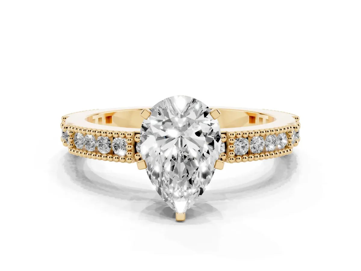 Pear Cut Solitaire with Pavé Band and Four-Prong Setting Yellow gold