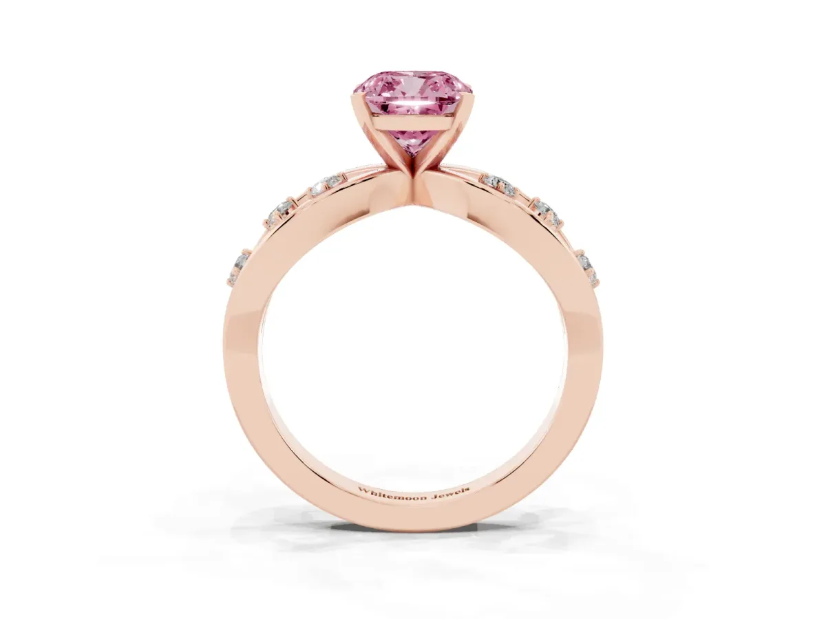 Fancy Pink Cushion Cut Cut Solitaire Diamond with Side Stones on Criss-Cross Band and Four-Prong Setting Rose gold