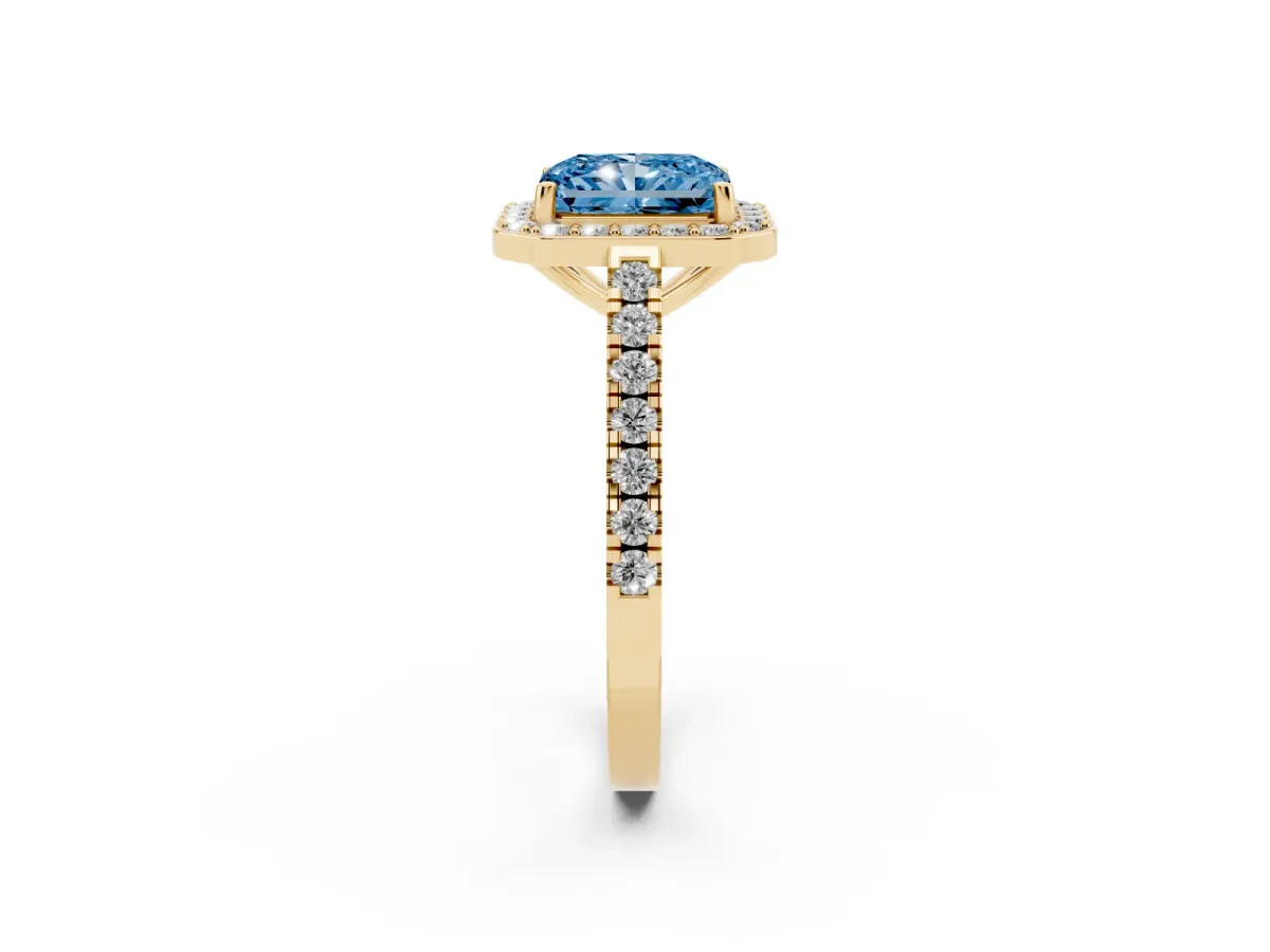 Fancy Blue Radiant Cut Diamond Halo Ring with Round Pavé Split Shank and Prong Setting Yellow gold